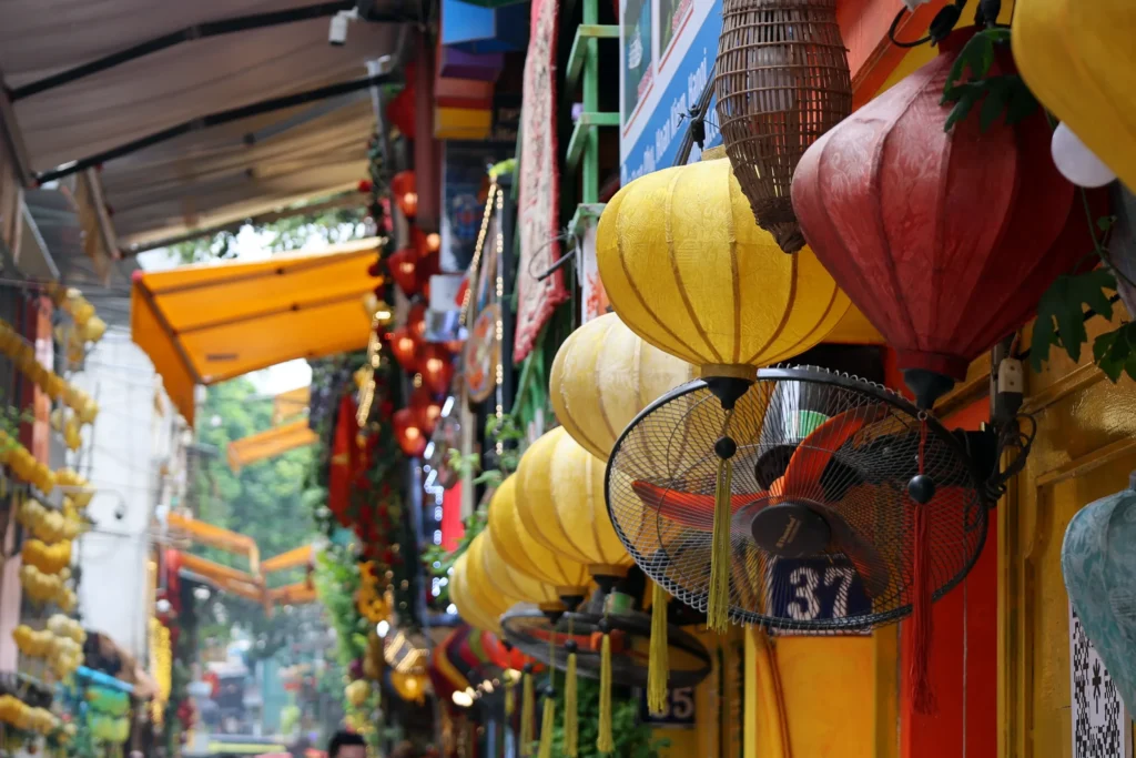 Travel planning experts on train street in Hanoi, Vietnam